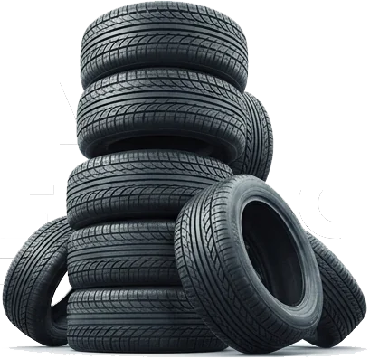 Stack of black car tires piled on top of each other with visible tread patterns against a white background